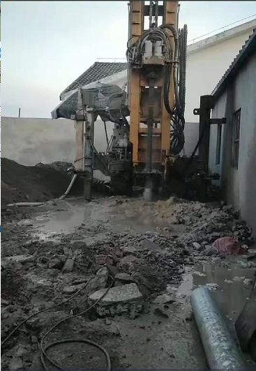 巖石井